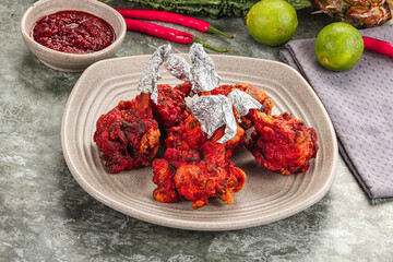 Indian cuisine - Red Chicken lolypops