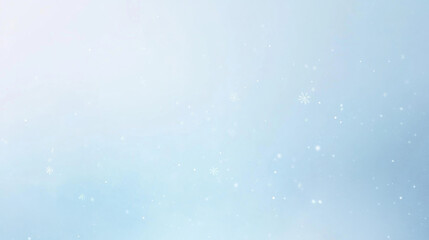 Fototapeta premium Soft snowflakes falling gently against serene blue gradient background, creating peaceful winter atmosphere