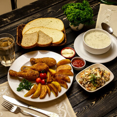 Business lunch for a business meeting. A dinner table consisting of meat, soup and vegetables