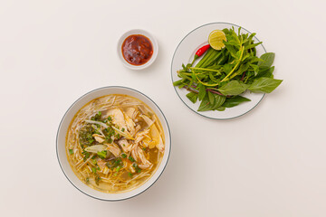 Mien Ga, Chicken cellophane noodles soup with vegetable, Vietnamese food isolated on white background, top view