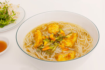 Banh Canh Ca Loc Mien Tay, Thick Rice noodle soup with Snakehead fish, close-up view