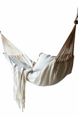 Cream hammock, draped fabric, and pillow.