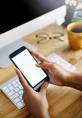 Phone, hands and woman with blank screen, computer and work from home with freelancer. Social media, app and notification at desk with mobile, texting and technology with internet search and mockup