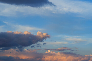 Beautiful sunset sky with clouds on the Black Sea. Orange, blue, blue sky, selective focus