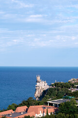 Swallow's Nest castle on a rock at Black Sea, Crimea, Russia. It is a symbol and landmark of Crimea. Nice view of Swallow's Nest at the precipice above abyss. Scene in the Southern coast of Crimea.