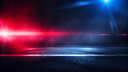 Obraz premium A vibrant red and blue light beam illuminates a dark road, creating a striking contrast in the night scene. 