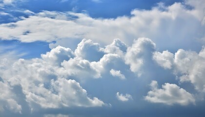 Obraz premium Artistic beauty of the sky with floating clouds in a serene atmosphere.