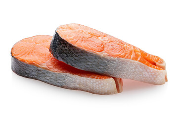 Two fresh raw salmon steaks lying on each other isolated on white background, sharpness across the entire object