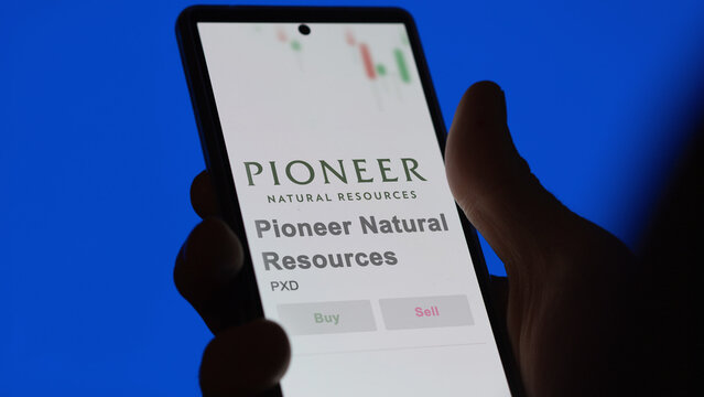 April 09th 2024 , Irving, Texas. Close up on logo of Pioneer Natural Resources on the screen of an exchange. Pioneer Natural Resources price stocks, $PXD on a device.