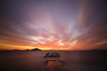 sunset on the beach. Seaside town of Turgutreis and spectacular sunsets. Selective Focus. Long Exposure shoot. tranquility scene.