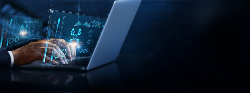 Blockchain Technology: Businessman using laptop and analyzing blockchain information on futuristic virtual interface screen, decentralization, security, smart contracts, transparency, digital ledger.