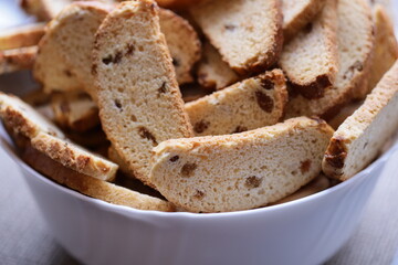 Freshly baked breadsticks arranged on a table.