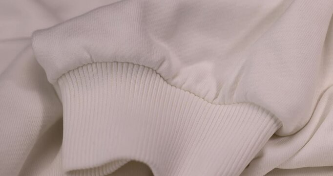 white fabric for the production of clothing, decorative items and other items, close-up of cotton fabric for the production of environmentally friendly clothing