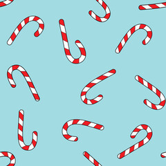 Seamless Pattern of Red and White Candy Canes with a Light Blue Background for Christmas