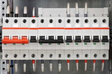 Automatic current switches to protect electrical loads. Soft focus.