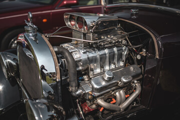 Classic vintage car with supercharged engine on the show.