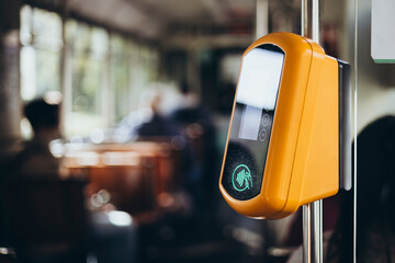 Tram with validator for self-payment. Fare control without a conductor.