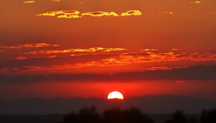 Stunning landscape with red sky at sunset