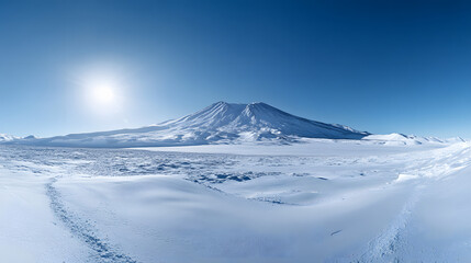 A beautiful panoramic view of a snow-covered mountain with a clear sky