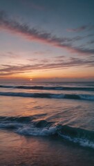 Fototapeta premium Long exposure of ocean at sunset with soft pink, white, and blue hues.