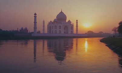 The iconic white marble Taj Mahal stands majestically by a river at sunset, illuminated in soft golden light.