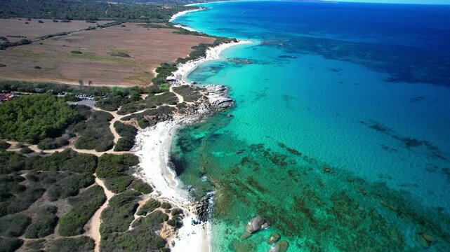 Italy . Most scenic beaches of Sardinia island (Sardegna) - beautiful Sant Elmo on the south, famous Costa Rei.  aerial drone 4k hd video
