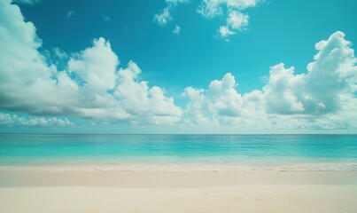 Obraz premium Tropical beach with turquoise water and clouds, serene atmosphere, soft sand, clear sky, peaceful escape