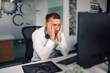 Exhausted office worker feeling bored and tired at work
