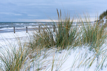 At the Baltic Sea in Germany with blue sky in winter time