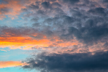 Sunset with beautiful rain clouds drifting across the sky