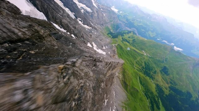 FPV Flight diving down west flank of the EIGER Switzerland Grindelwald