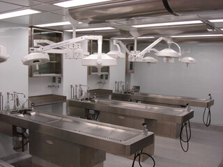 Sterile Autopsy Room with Stainless Steel Workstations and Surgical Lights