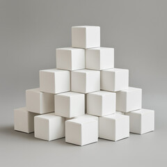 Obraz premium Blank white mock-up boxes standing in the shape of a pyramid