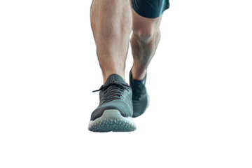 A person jogging on a solid surface wearing athletic shoes during daytime, focusing on foot movement and exercise