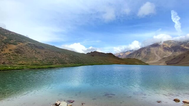 View of chandratal lake and himalayan mountains at chandratal in lahaul and spiti himachal pradesh, India.