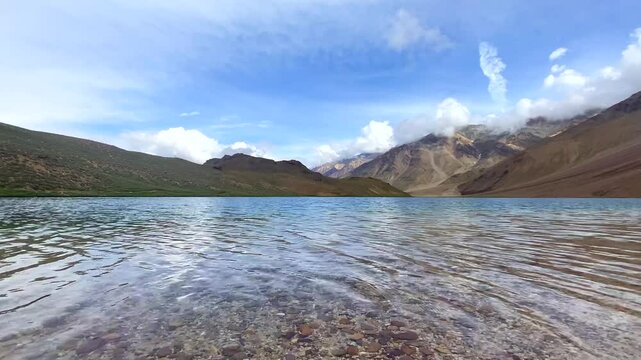 View of chandratal lake and himalayan mountains at chandratal in lahaul and spiti himachal pradesh, India.