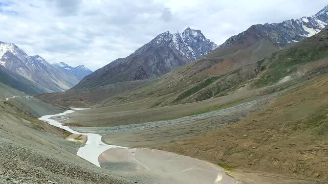Beautiful view of himalayan mountain landscape at dhar pallamo and chenab river road from batal to chandratal in lahaul and spiti, himachal pradesh, India.