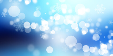 Winter snow background, with beautiful light and snow flakes on the blue sky, beautiful circles, banner format, copy space