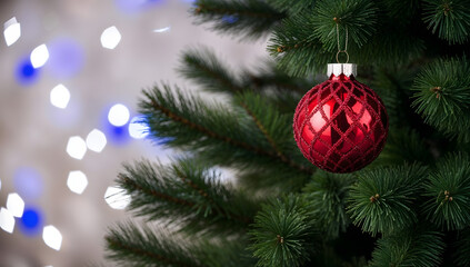 Fototapeta premium Merry Christmas and Happy New Year. Festive bright beautiful background. Decorated Christmas tree on blurred background. de-focused lights, gold bokeh X Mas