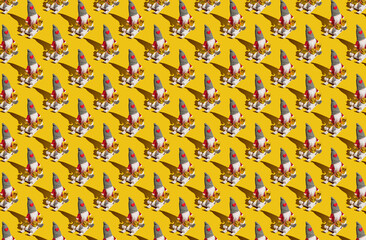 Fototapeta premium Pattern of santa Claus yellow pastel background