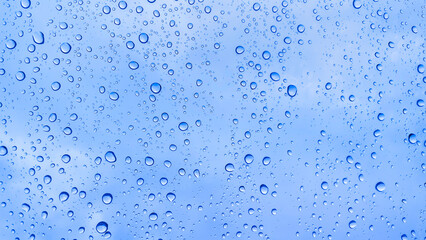Abstract background with raindrops on glass