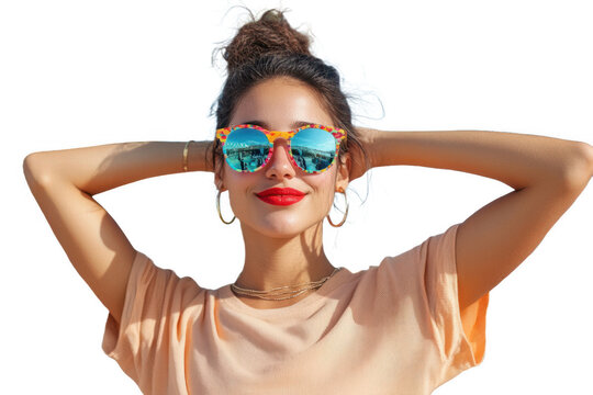 A woman enjoying a sunny day outdoors, wearing colorful sunglasses and striking a confident pose against a bright background