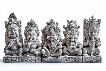 Fototapeta premium Five ornate stone figures, seated, smiling.
