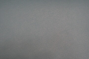 Close-Up Texture of a Coarse, Dark Woven Fabric with Grid-Like Pattern and Subtle Depth in Dark Gray and Black Tones