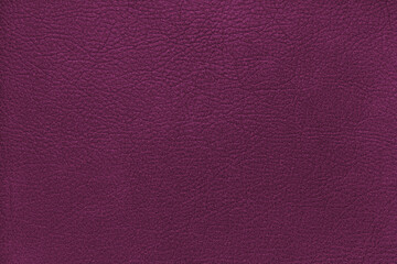 Natural, genuine solid pink leather texture close up, macro. Structure of matte leatherette, artifical skin surface with embossing pattern. Background, wallpaper, backdrop