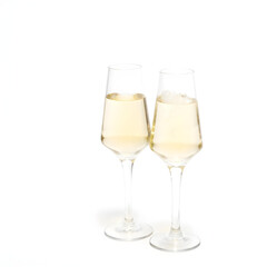 Fototapeta premium A pair of champagne glasses clinking on a white background