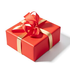 Obraz premium A gift box wrapped in red and gold paper on a white background