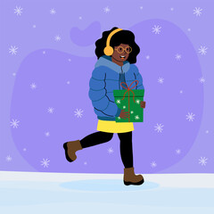 Fototapeta premium Girl enjoying a winter walk while holding a holiday gift against a snowy backdrop