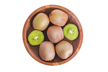 Kiwi fruit whole and cut in a wooden plate isolated