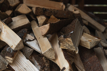 Chopped firewood in a pile. Getting ready for coming winter on the Swedish countryside. 